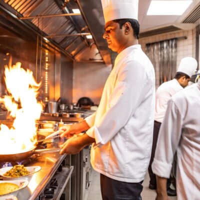 Chef making food for a restaurant using NSnappy device and software